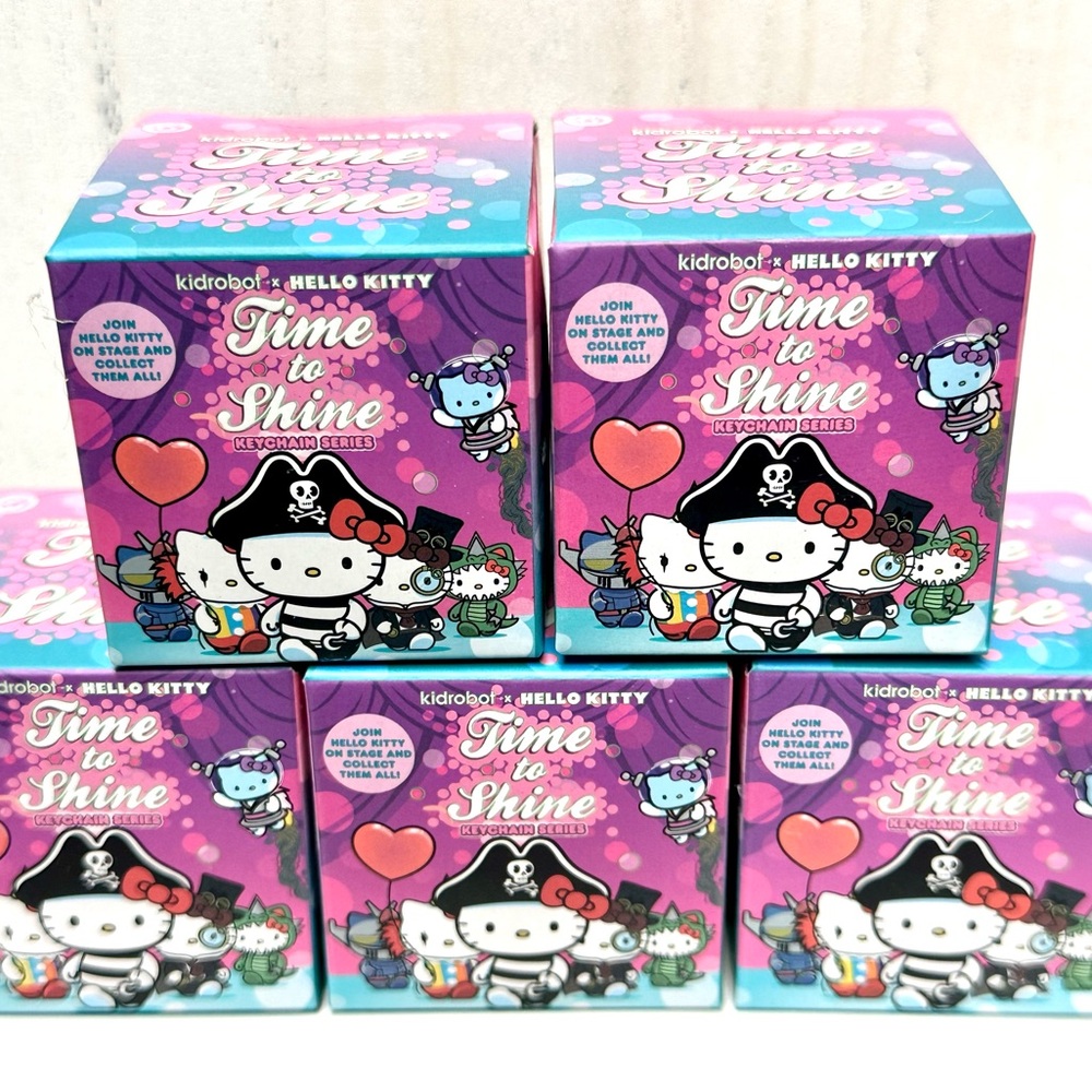 Hello Kitty Kidrobot keychain series blind boxes.  5 new, unopened cuties!!